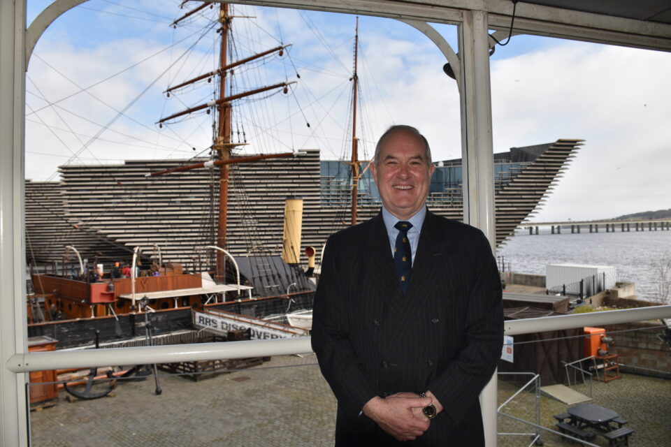 David Caddick with the Royal Research Ship Discovery and V&A Dundee in the background